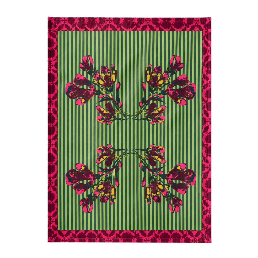 Fuchsia maximalist floral kitchen towel with mirrored magenta bouquets on a green and white pinstripe ground.