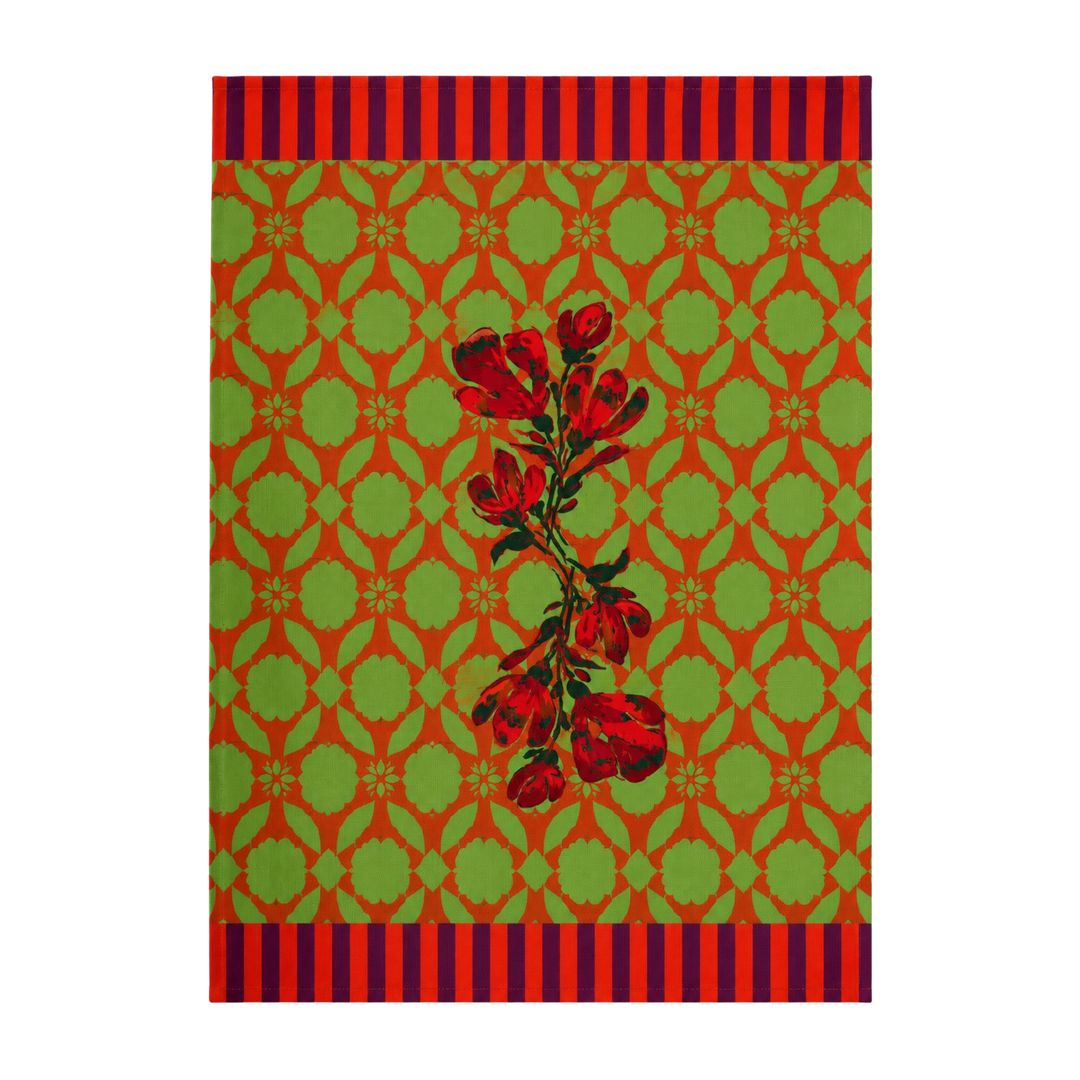 Green orange trellis kitchen towel with a red rose spray on a green and orange lattice ground and navy striped borders.