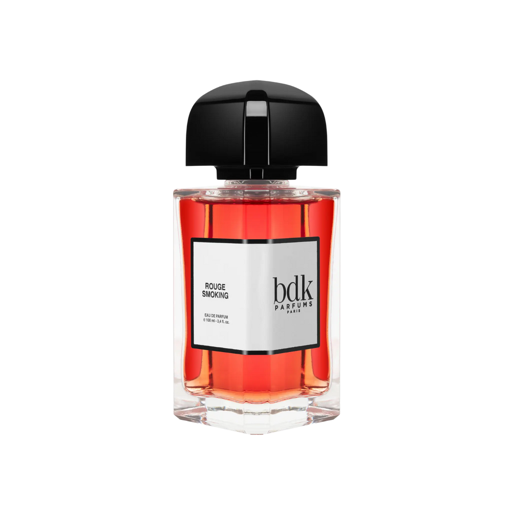 Rouge Smoking Eau de Parfum by BDK Parfums - side view of unisex niche amber fruity spicy red fragrance bottle with bdk Parfums label