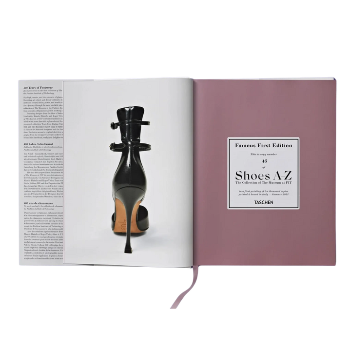 Numbered Famous First Edition page of Shoes A-Z by Taschen beside a black strapped high heel photo