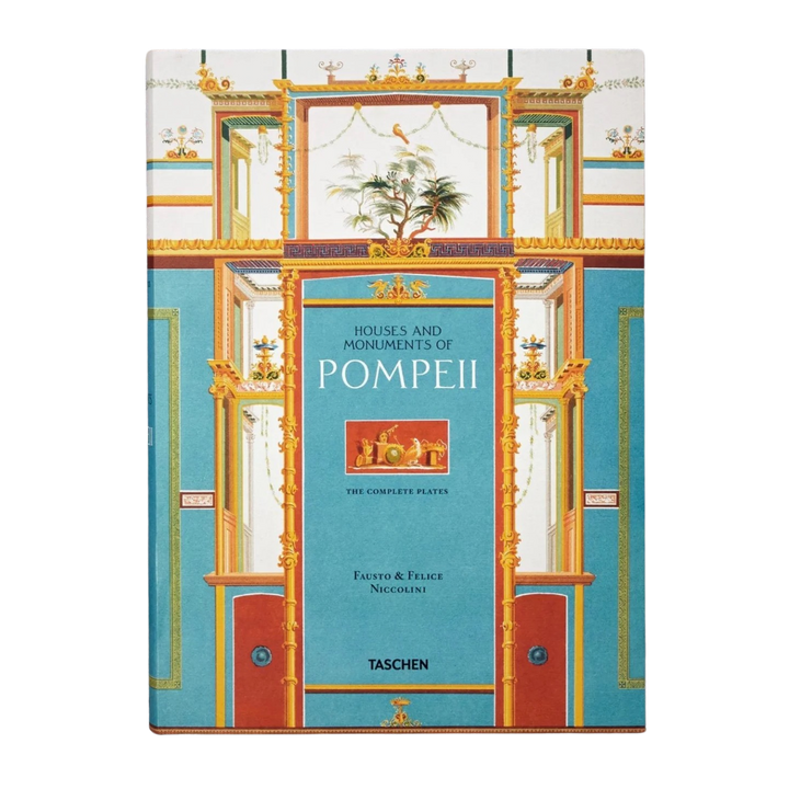 Houses and Monuments of Pompeii XXL book by TASCHEN, turquoise cover with a gold and red Pompeian fresco doorway