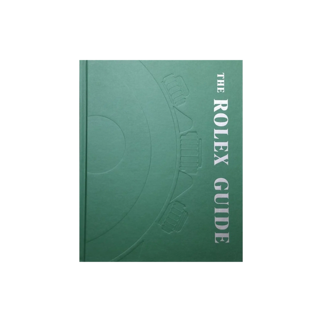 The Rolex Guide by Mads Urup Gjødesen, New Mags, green hardcover with embossed watch design and silver title on the spine