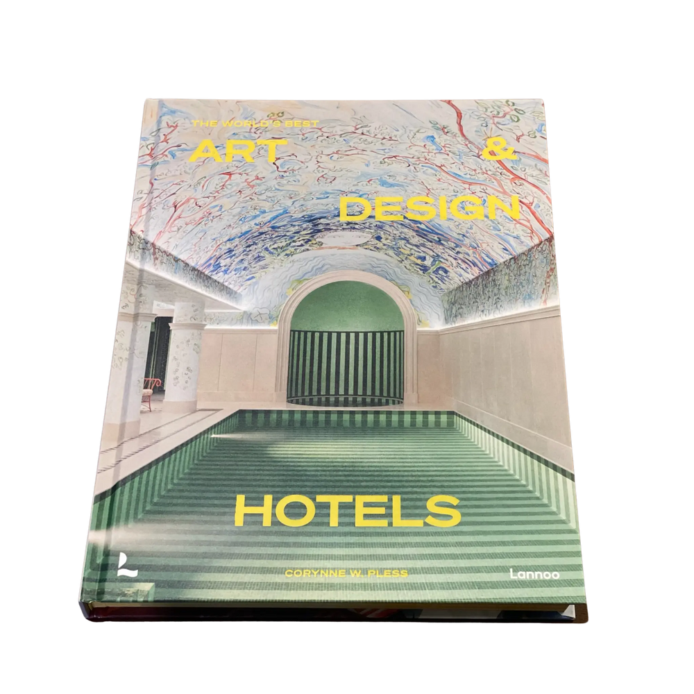 Front cover of The World's Best Art and Design Hotels by Corynne W. Pless with a painted ceiling and striped green pool